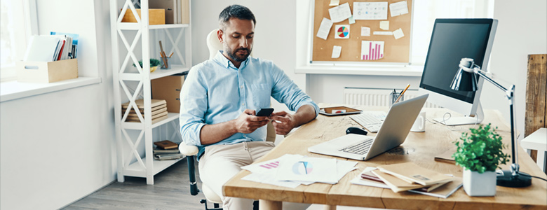 Man checking his emails on his smartphone